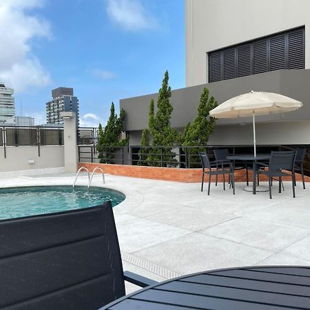 Flat No Hotel Cosmopolitan Com Estacionamento Gratis E Piscina Santos  Buitenkant foto